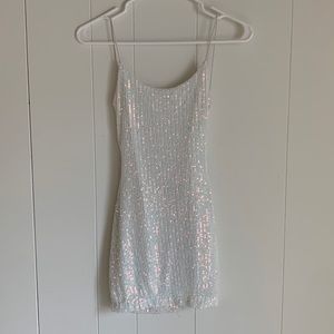 White sparkly mini dress partially open back size 1/2